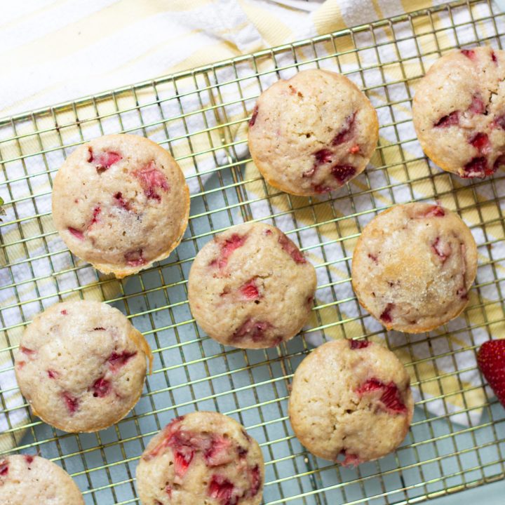 homemade strawberry muffins on a cooling rack